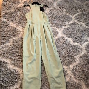 Sage green racer back jumpsuit with pockets!